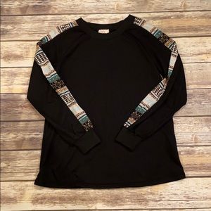 Black sweater with aztec detail